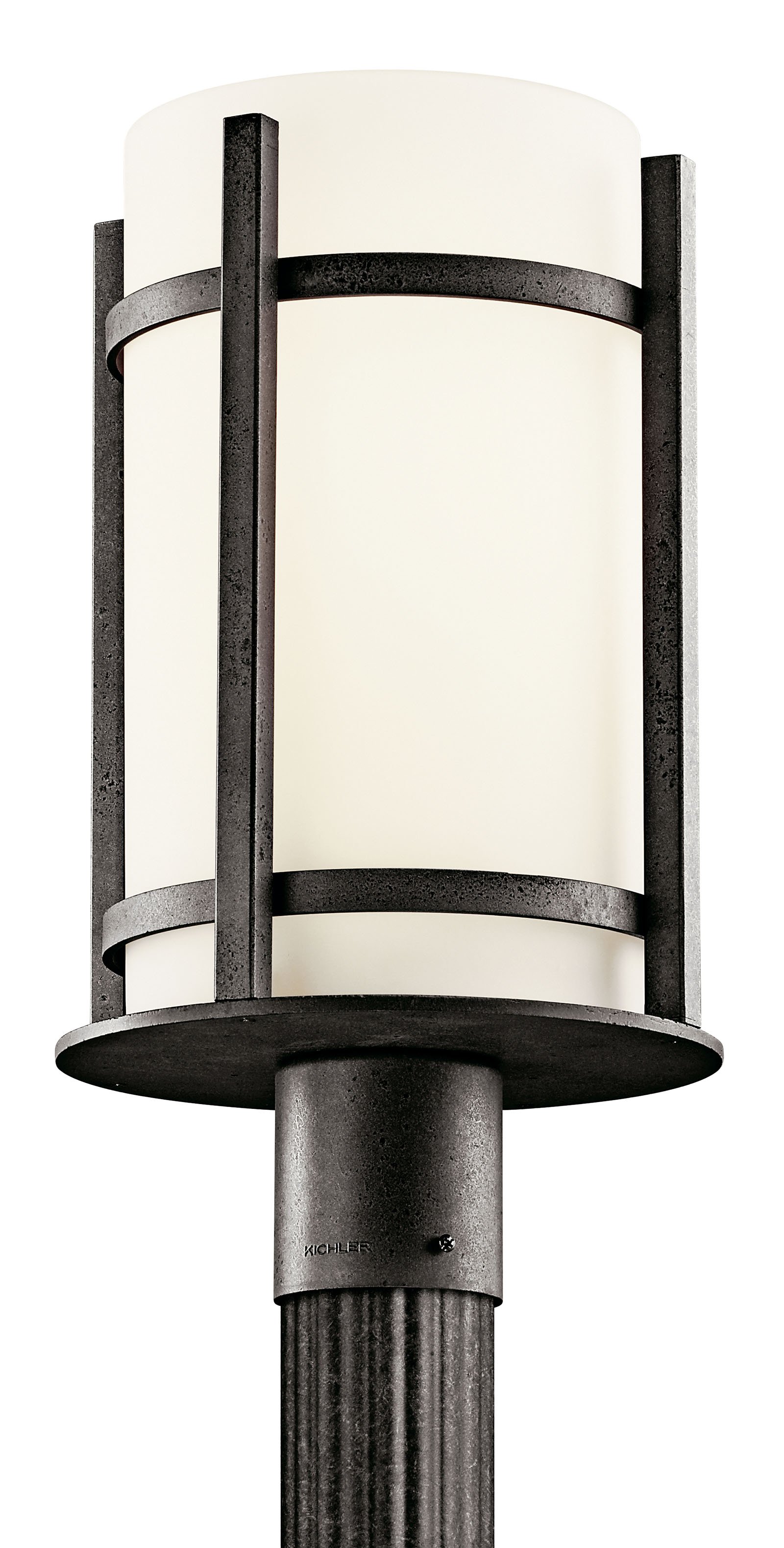 The lodge-style Camden(TM) collection draws inspiration from the Arts and Crafts movement with its clean lines and right angles. This 1 light post features a sturdy cast aluminum construction, a deep Anvil Iron finish and an Opal Etched cylindrical glass shade to bring a crisp, structural simplicity to any outdoor living - whether it be a covered porch, deck, patio or walkway.
