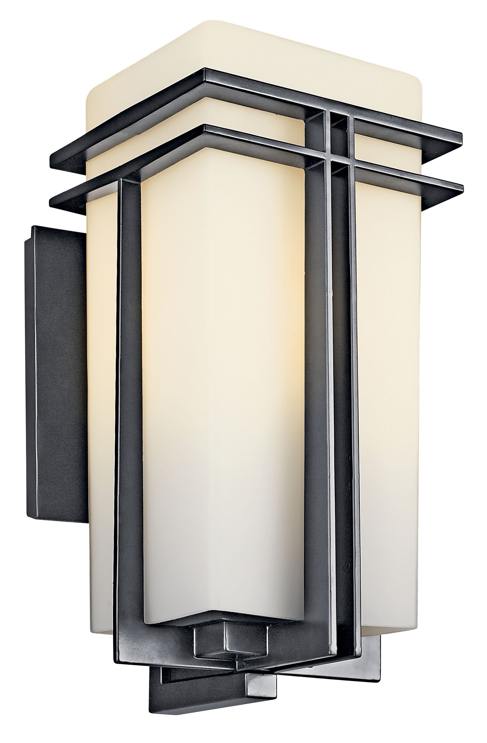 This 1 light wall fixture from the Tremillo(TM) collection offers a smooth, clean profile. Double lines of Black finish form sleek perpendiculars that contrast well with the pleasant ambience of Satin Etched Cased Opal Glass. This design will mark any walkway or porch with sleek sophistication and well-balanced grandeur.