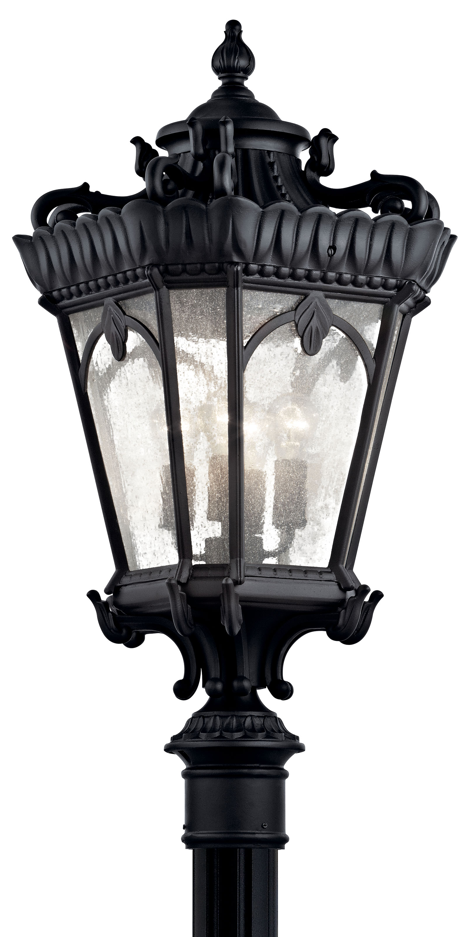 With its heavy textures, dark tones and fine attention to detail, this 4 light mounted outdoor post from the Tournai(TM) collection stands out from other outdoor fixtures. Handmade from cast aluminum, its distinctive Textured Black finish and Clear Seedy Glass panels give this piece a unique aged look.