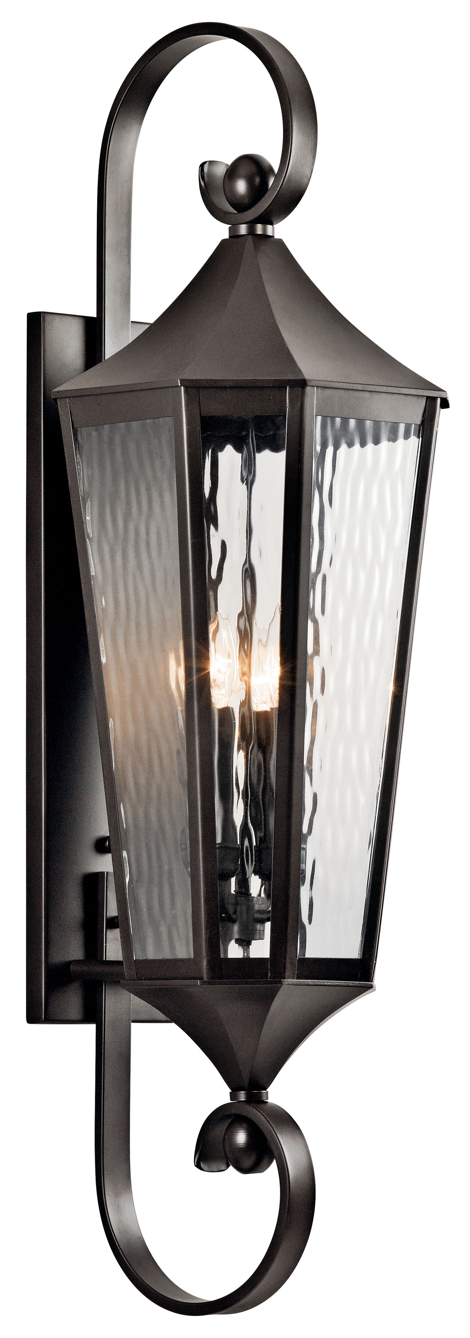 Traditional design gets a clean updated twist with this 4 light outdoor wall fixture from the Rochdale collection. The Olde Bronze tapered design stands tall and elongated giving the vertical rain glass a chance to dazzle.