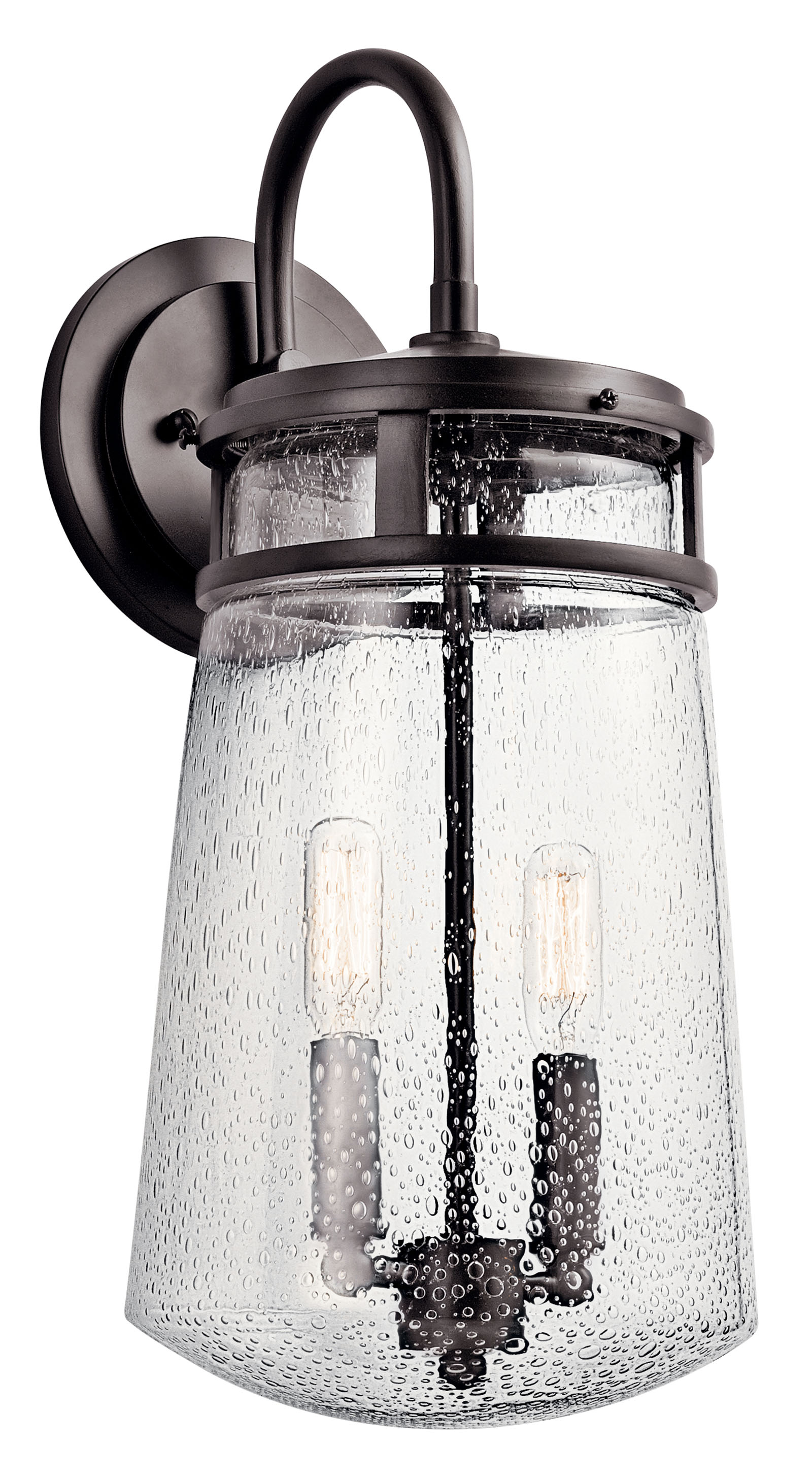 The Lyndon(TM) 18.25in. 2 light wall light features a classic look with its Architectural Bronze finish and clear seeded glass. The Lyndon(TM) wall light works in several aesthetic environments, including transitional and nautical.