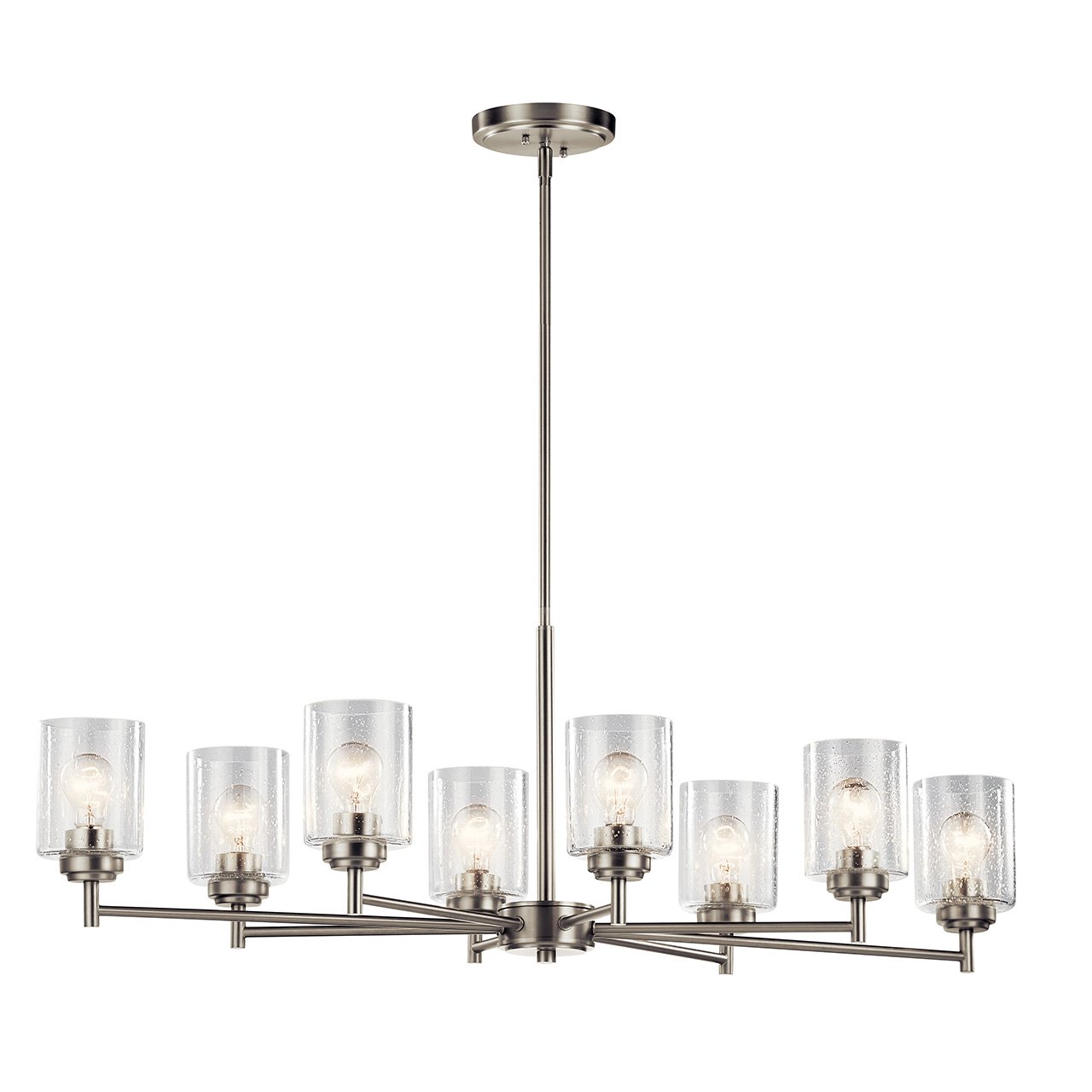 The modern Winslow 8 light chandelier in a Brushed Nickel finish with Clear Seeded glass shade pair beautifully with the linear arms, bringing light and dimension to a space.