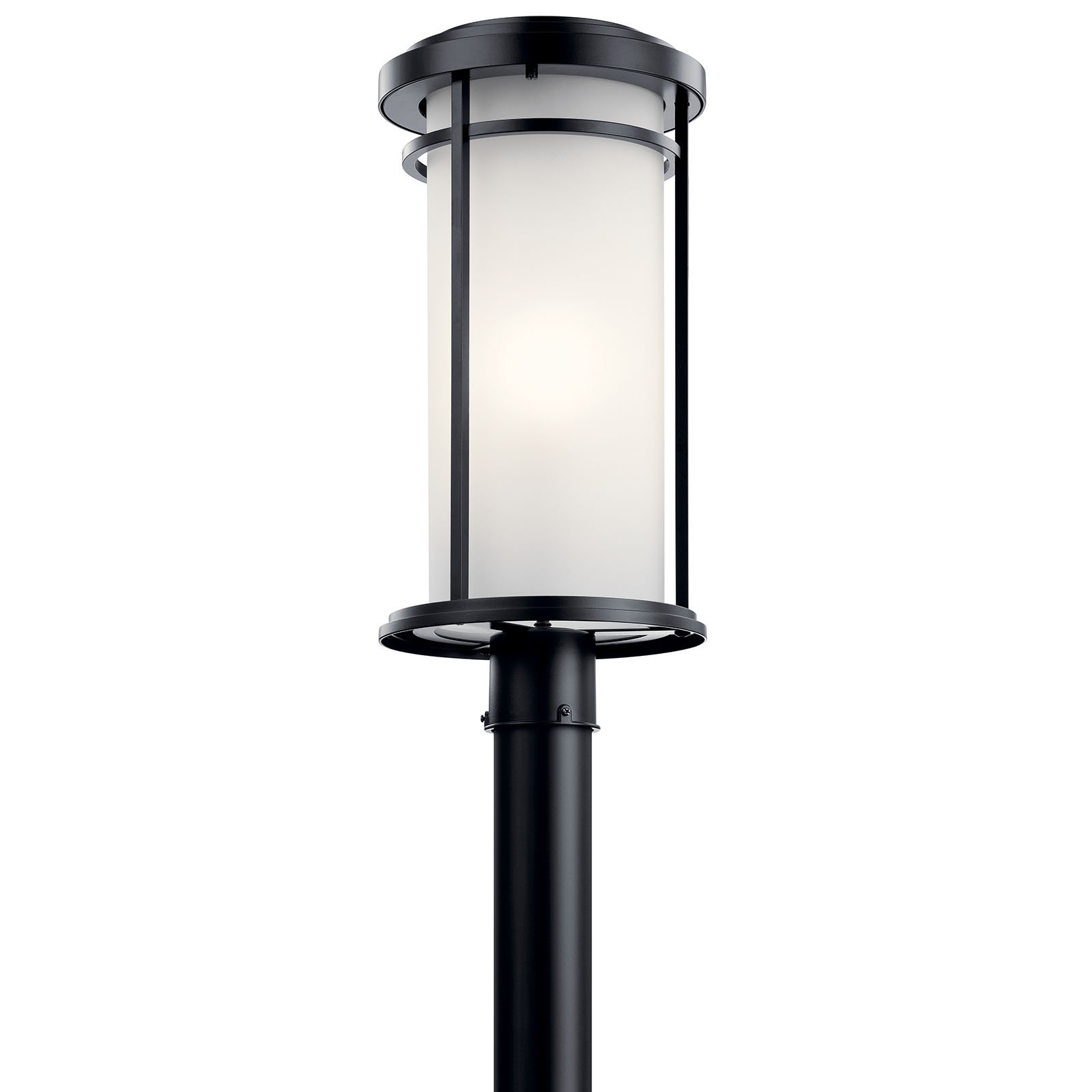 Toman creates a simple interpretation of Arts and Crafts style with its outdoor post lantern. This fixture enhances your curb-appeal with its use of a Black finish and satin etched cased opal glass.
