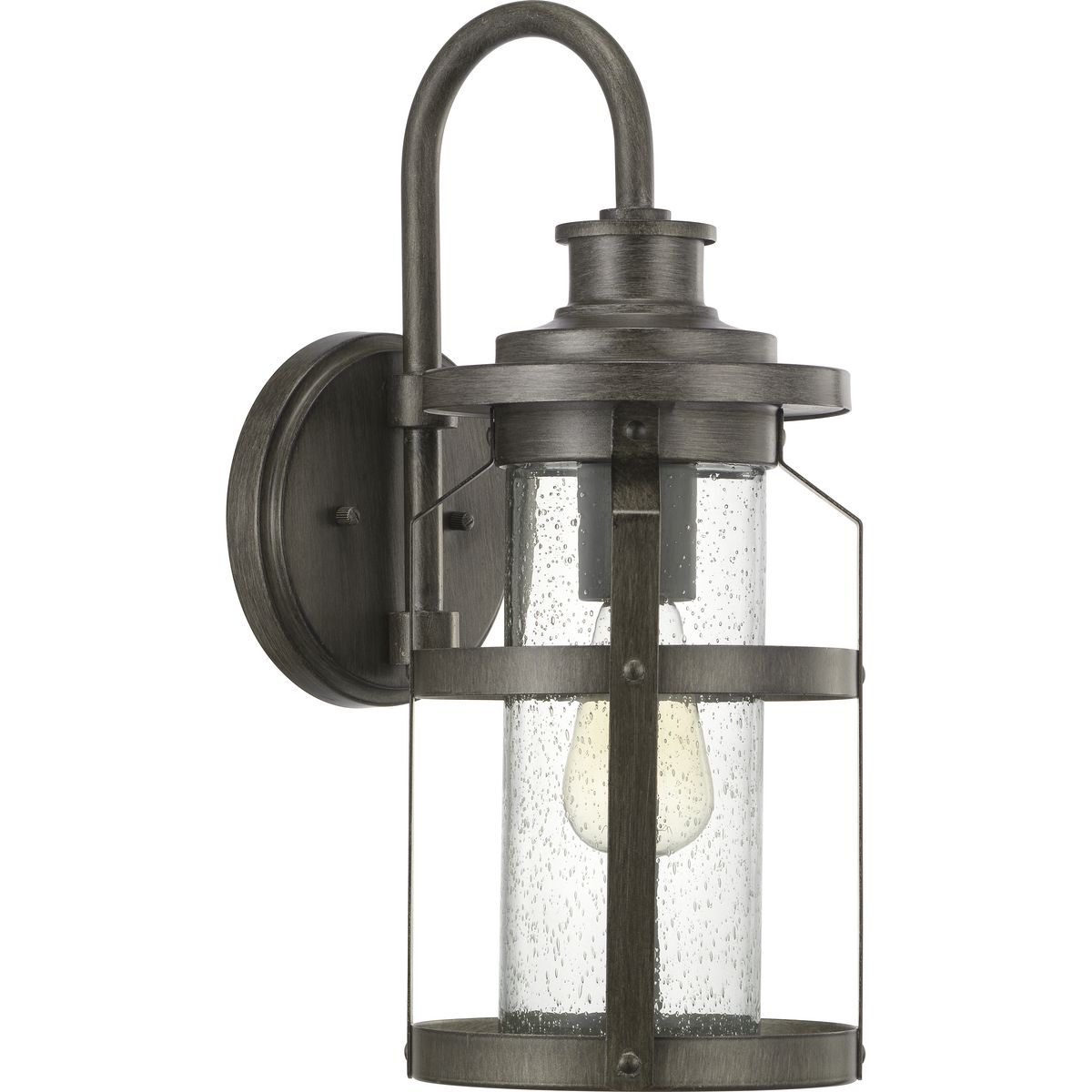 The one-light medium wall lantern in the Haslett Collection features a design with intersecting linear details that surrounds clear seeded glass and finished in Antique Pewter. Coastal-inspired frame is suitable to complement architecture with Farmhouse flair.