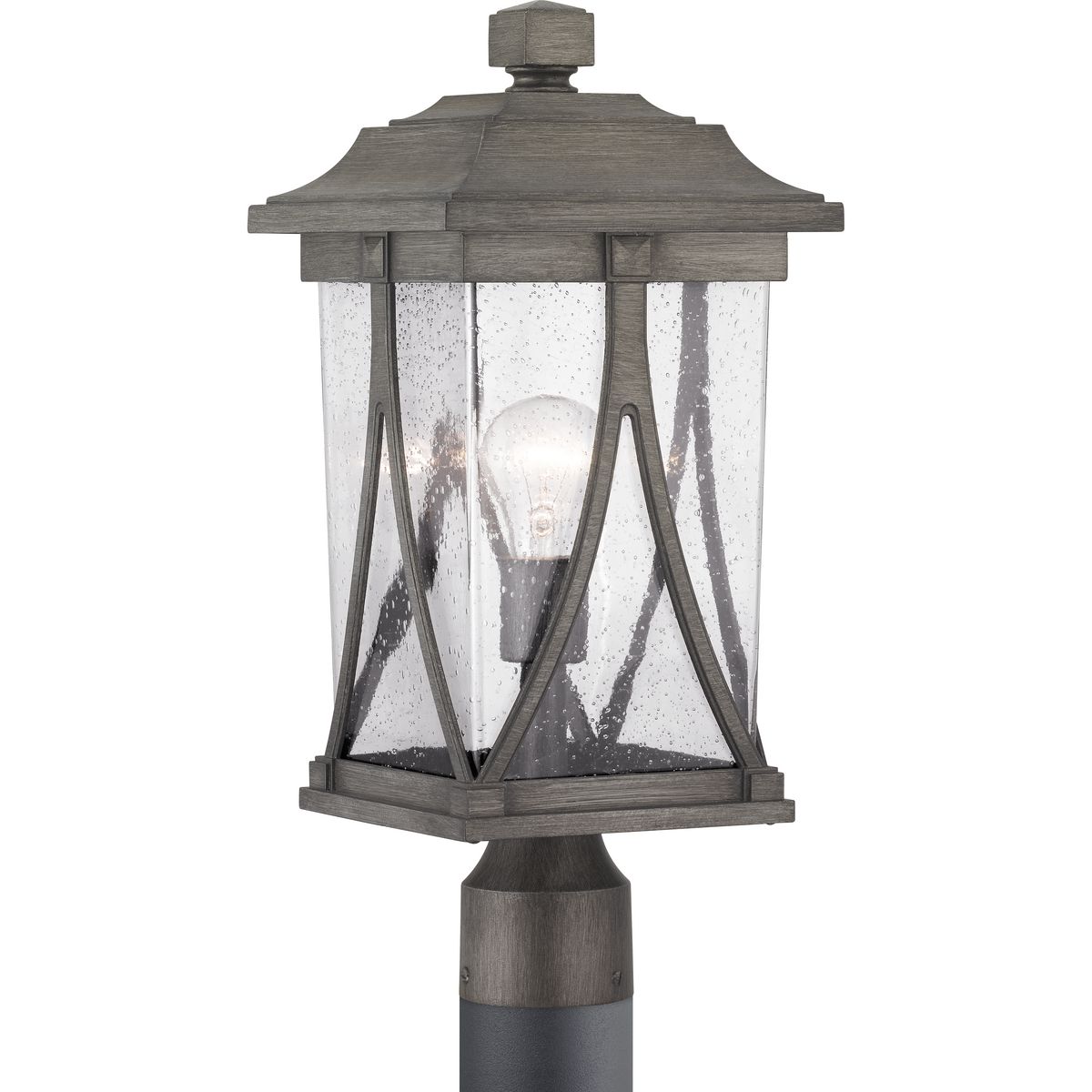 Distinctive forms with ancient roots are featured in this post lantern from the Abbott Collection. Transparency, depth and dimension are all on display to highlight the clear seeded glass and sweeping details within the Antique Pewter frame.