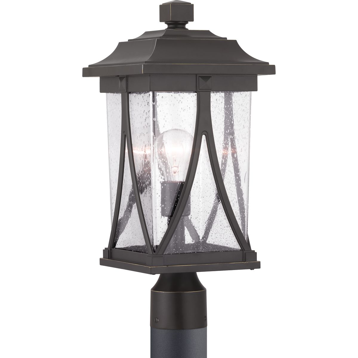 Distinctive forms with ancient roots are featured in this post lantern from the Abbott Collection. Transparency, depth and dimension are all on display to highlight the clear seeded glass and sweeping details within the Antique Bronze frame.