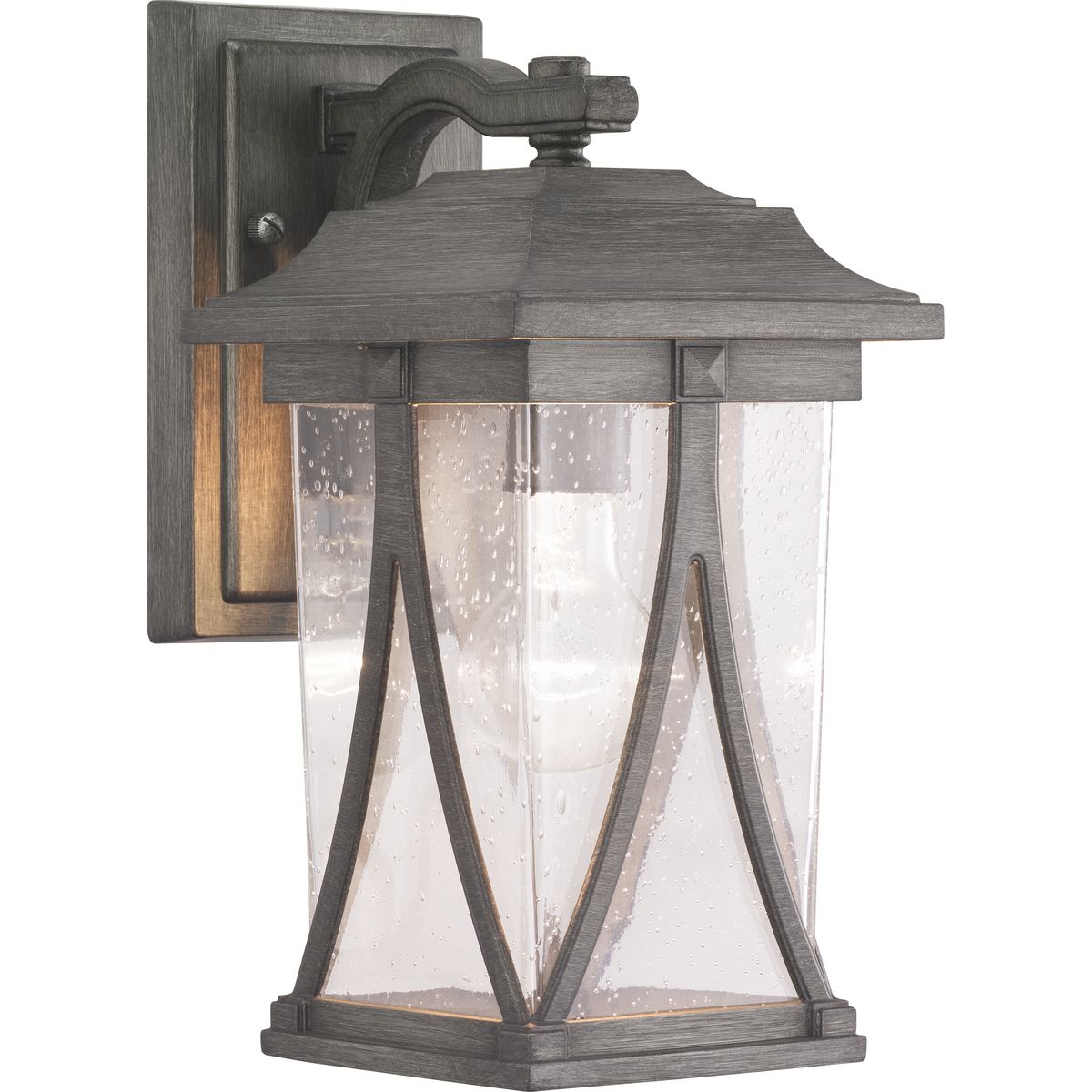 Distinctive forms with ancient roots are featured in this small wall lantern from the Abbott Collection. Transparency, depth and dimension are all on display to highlight the clear seeded glass and sweeping details within the Antique Pewter frame.