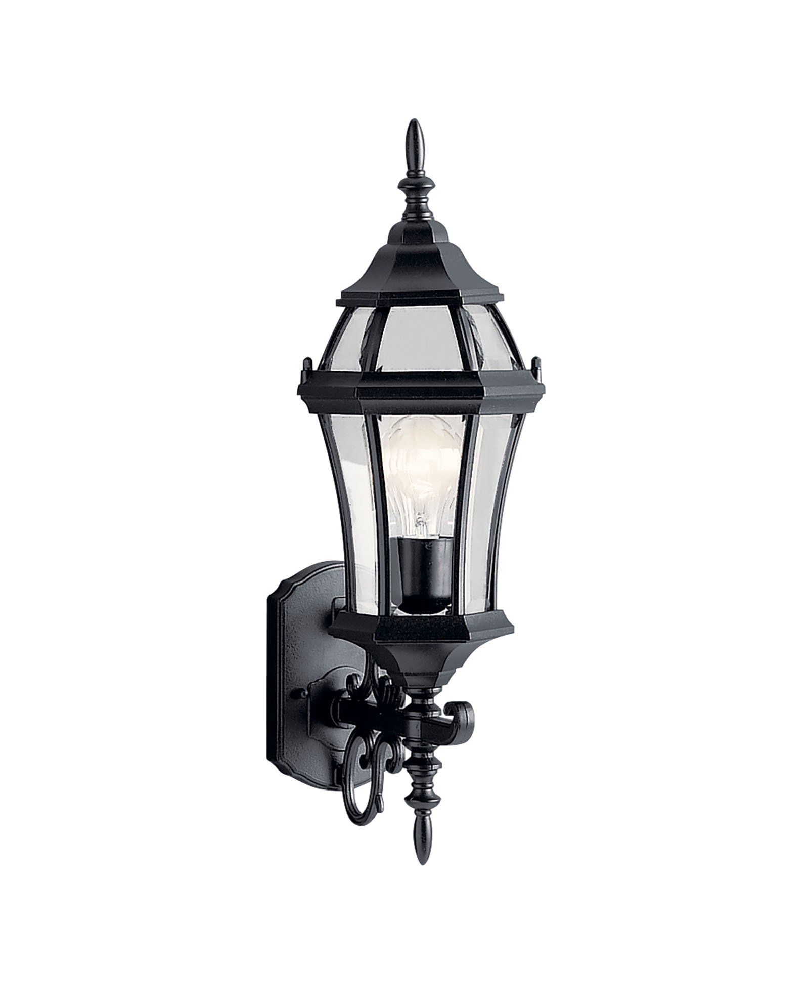 With its tall and intricate design, the Townhouse(TM) Collection adds classic form to Kichler's expansive assortment of decorative outdoor lighting. Made by the finest craftsmen in the industry, each piece is formed from cast aluminum and is U.L. listed for wet location, ensuring these high quality fixtures will continue looking fabulous for years to come. This 21.5in. high, 1-light wall lantern features our Black finish with clear beveled glass panels, which uses a 100-watt (max.) bulb that accentuates the luster of your home with zeal.