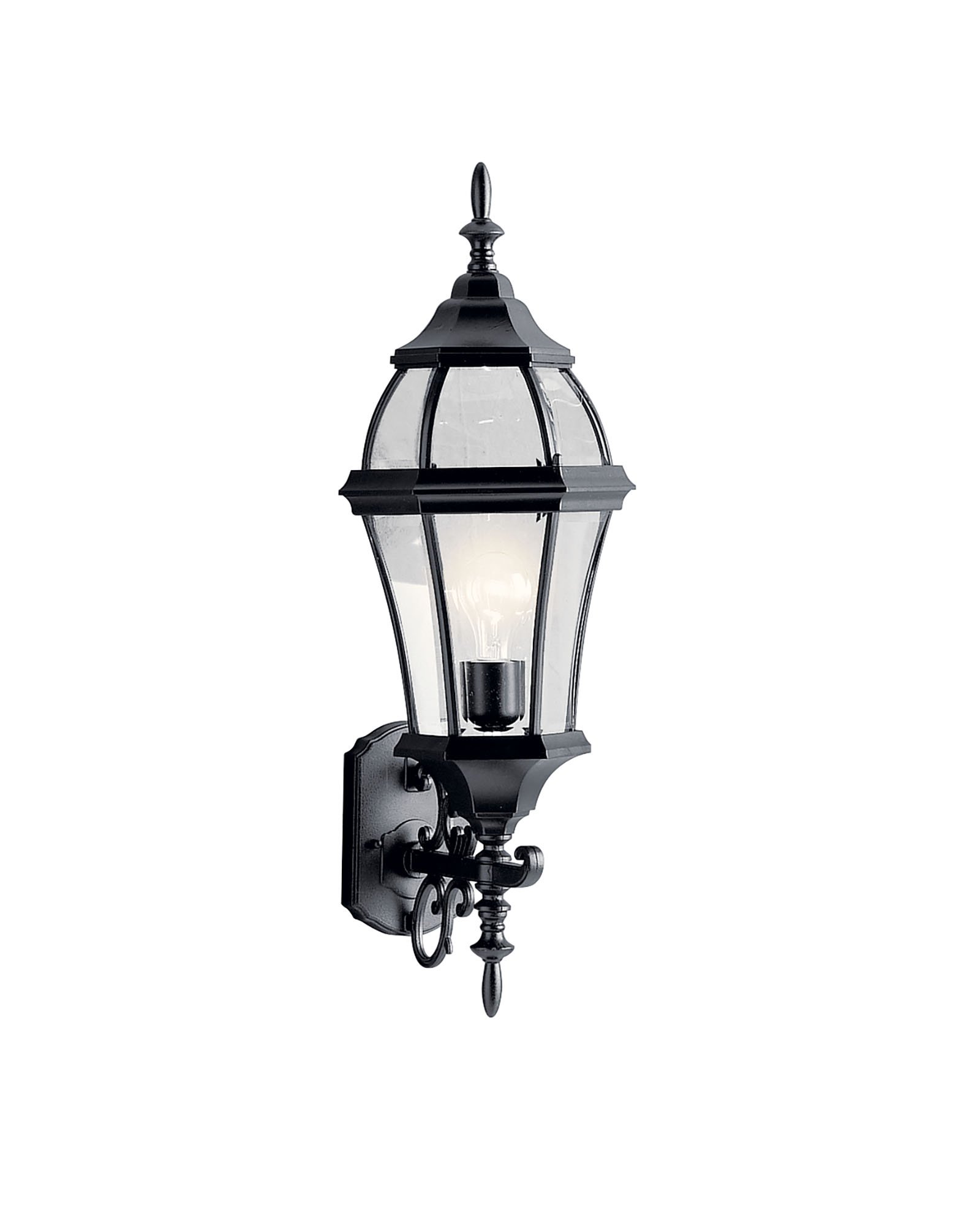 With its tall and intricate design, the Townhouse(TM) Collection adds classic form to Kichler's expansive assortment of decorative outdoor lighting. Made by the finest craftsmen in the industry, each piece is formed from cast aluminum and is U.L. listed wet location, ensuring these high quality fixtures will continue looking fabulous for years to come. This 27in. high, 1-light wall lantern features our Black finish with clear beveled glass panels, which uses a100-watt (max.) bulb that accentuates the luster of your home with zeal.