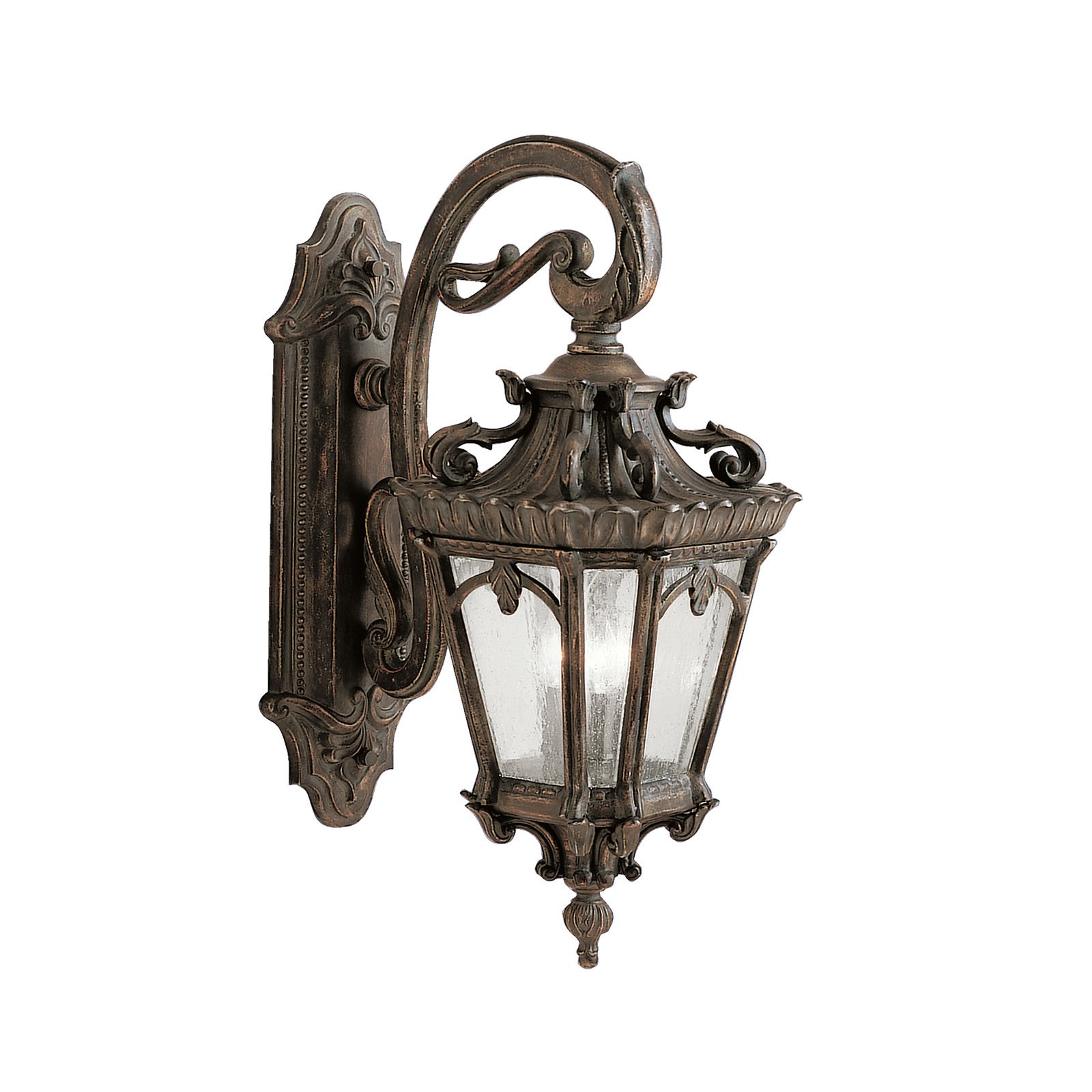With its heavy textures, dark tones, and fine attention to detail, the Tournai(TM) Collection stands out from other outdoor fixtures. Each piece is hand-made from cast aluminum, offering quality construction that is sure to withstand even the harshest of weather conditions. Our exclusive Londonderry finish and clear seedy glass panels give the piece its unique, aged look.  If you want the classic profile of the wall lantern, this Tournai(TM) outdoor lamp deserves your attention. Its 3-light design uses 60-watt (max.) bulbs to deliver lighting ideal for everyday use. Although it measures 29in. high, the fixture is provided with height mounting hardware and is U.L. listed for wet locations.