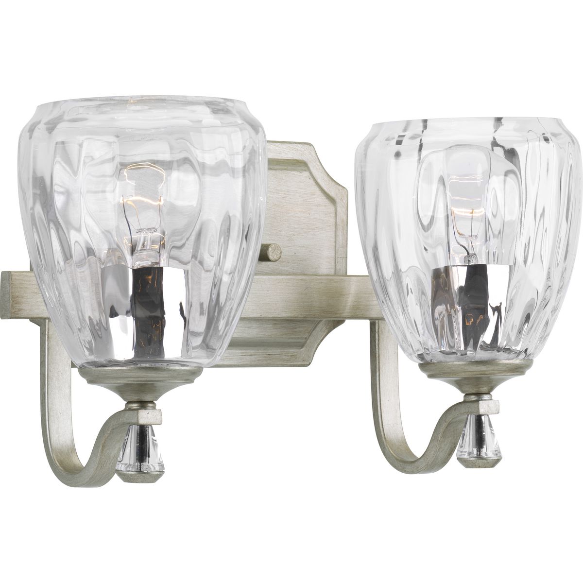 The Anjoux Collection is distinctive with casual crystal details. The two-light bath and vanity fixture features clear water glass shades and an Antique Bronze finish with champagne bronze accents. Anjoux is a truly versatile lighting collection that can complement a wide range of design spaces.