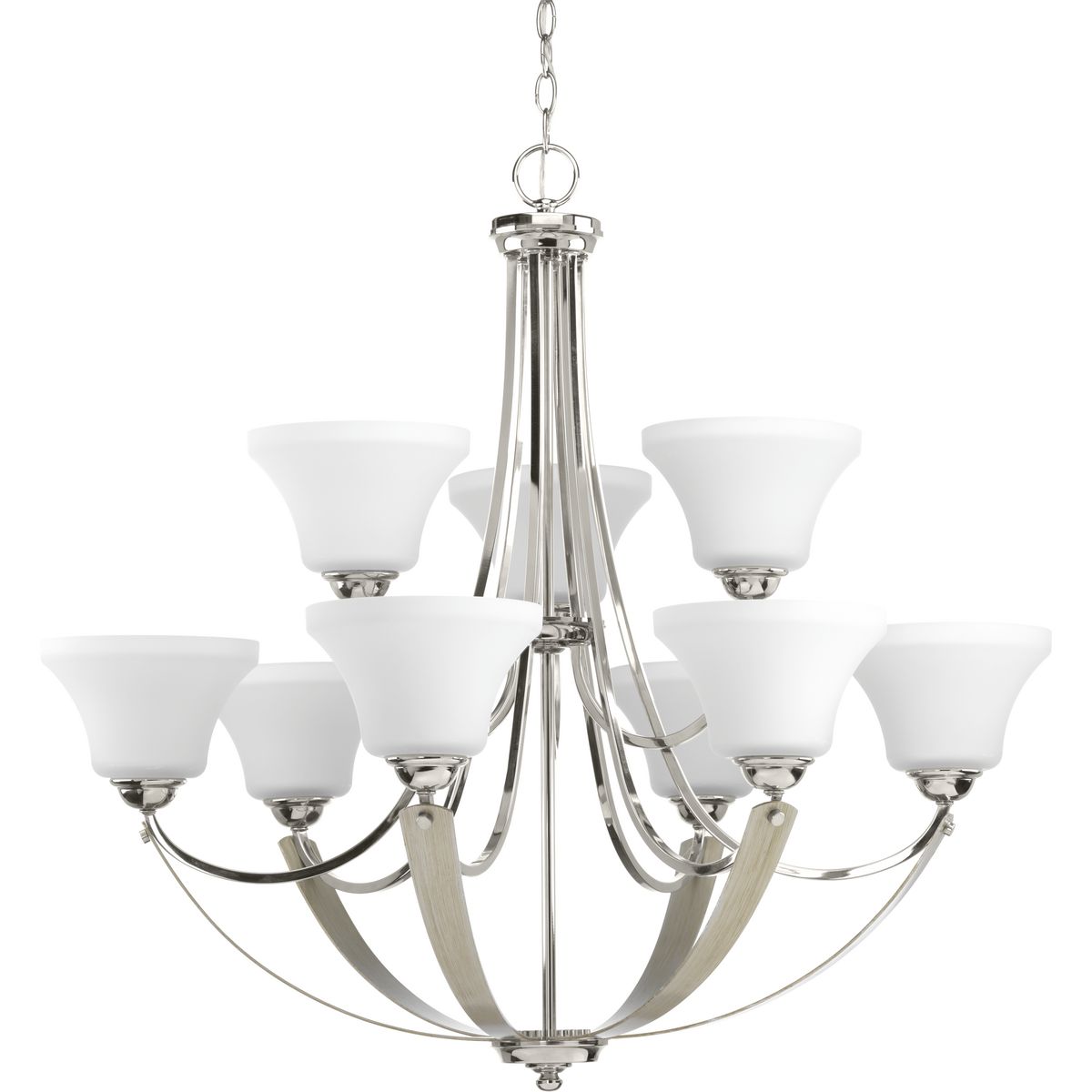 Mixed finishes of Polished Nickel with Silver Ridge accents are highlighted in Noma. Soft angles and curving lines created from flat metal straps elegantly frame etched white glass shades. The nine-light, two-tier chandelier is part of our Design Series collections.