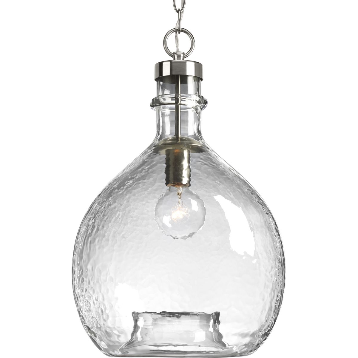 Inspired by a beautiful wine cask design, the Zin pendants are artfully formed from one large piece of glass. The one-light pendant has a Brushed Nickel finish with solid, textured clear glass. Create a customized look for Rustic Farmhouse and Modern Farmhouse to Urban Industrial settings by grouping several pendants together in a kitchen, entryway or living room setting. Perfectly imperfect, the design offers dimension and visual texture.