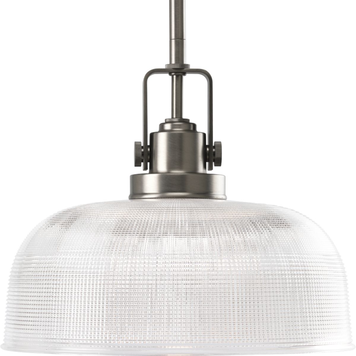 The Archie Collection brings a vintage, industrial flair to interior settings. The collection�s distinctive double prismatic glass adds visual interest as its crisscross pattern comes to life when illuminated. The distinctive finely crafted strap and knob detail adds authentic industrial flair. This one-light pendant is perfect for kitchens, dining rooms, rec room and anywhere pendants could be used. Antique Nickel finish.
