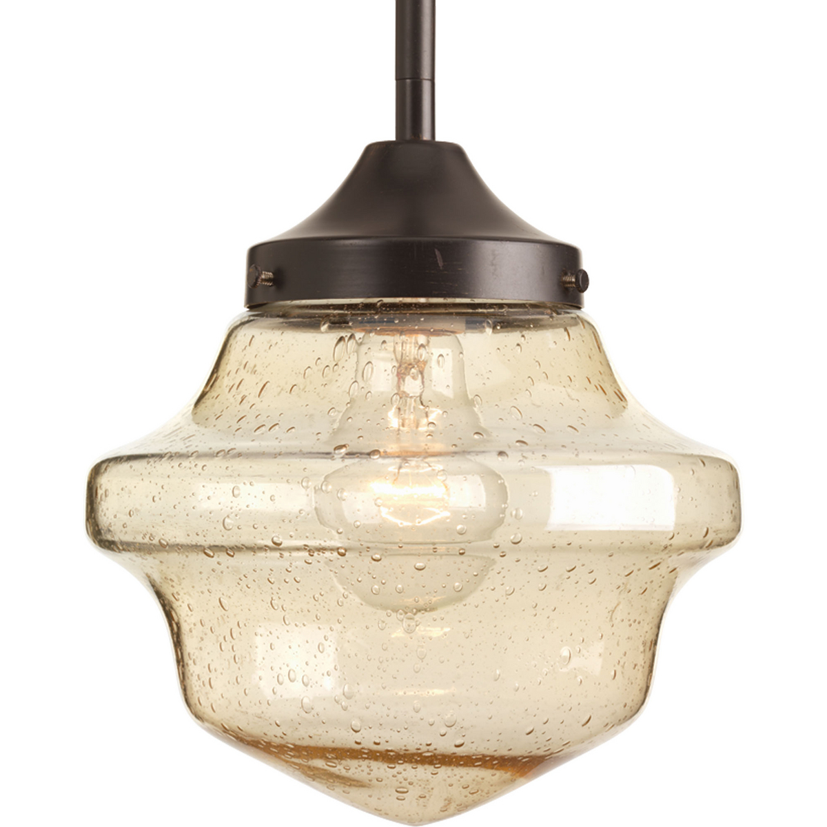 Antique Bronze one-light 8 inch pendant features a nostalgic, yet decidedly modern, design with a light umber seeded globe. Ideal in farmhouse, urban industrial and transitional kitchens.