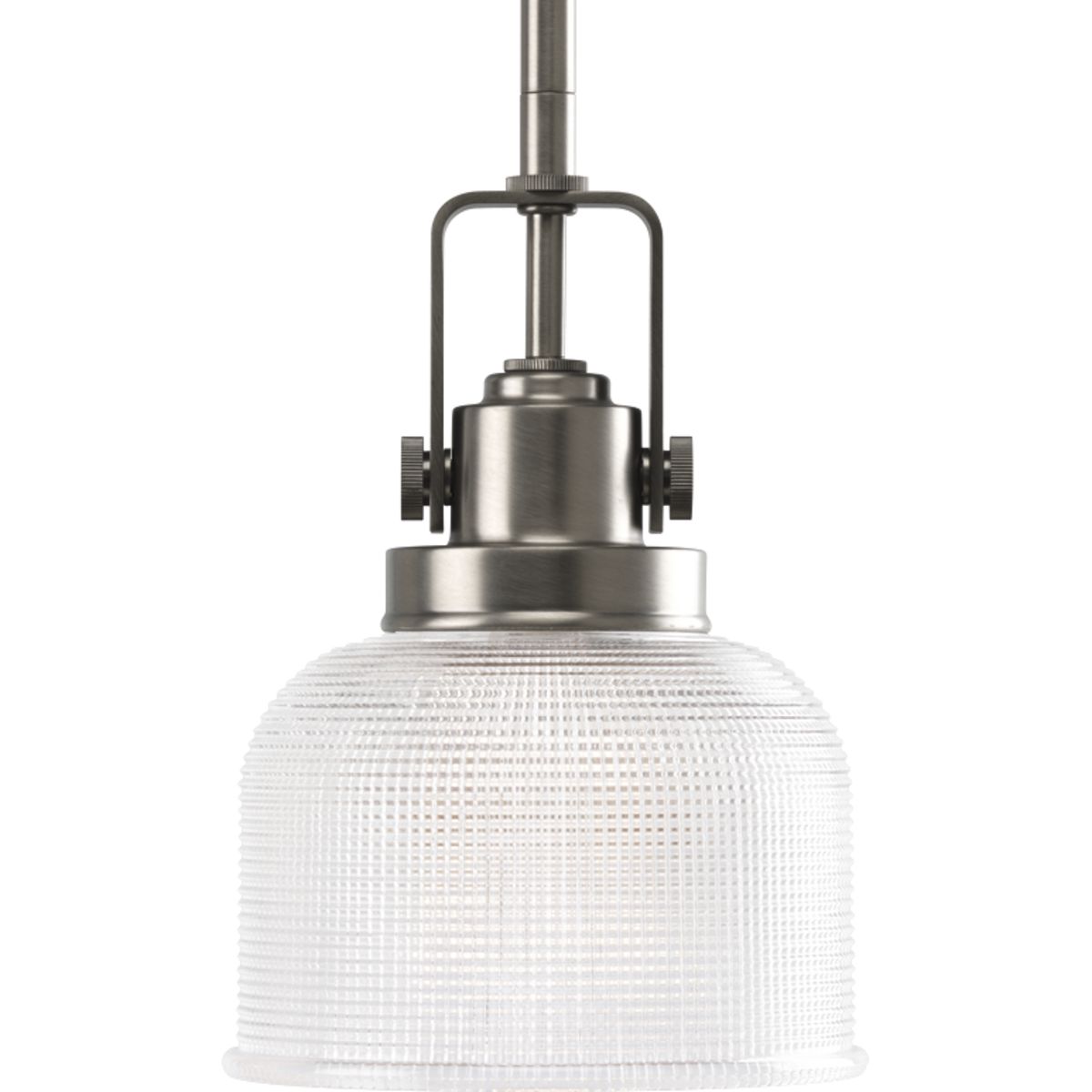 The Archie Collection brings a vintage, industrial flair to interior settings. The collection�s distinctive double prismatic glass adds visual interest as its crisscross pattern comes to life when illuminated. The distinctive finely crafted strap and knob detail adds authentic industrial flair. This one-light mini-pendant is perfect for kitchens, dining rooms, rec room and anywhere pendants could be used. Antique Nickel finish.