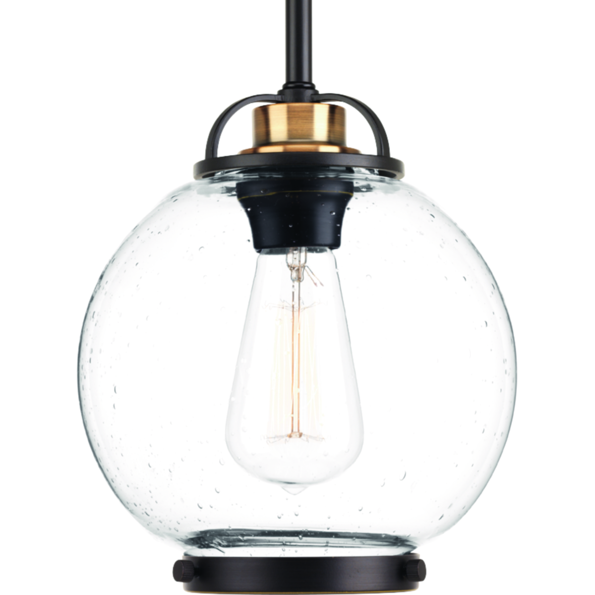 Chronicle one-light mini-pendants add visual interest and are ideal for commercial-style home kitchens or vintage dining areas. A metal trim accent ring adds a finishing touch the spherical glass globe. Clear seeded glass with an Antique Bronze frame.