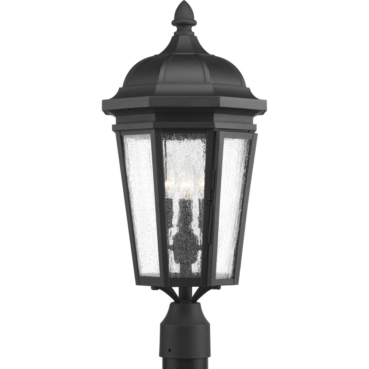 The three-light post lantern in the Verdae collection offers traditional styling for a variety of exteriors. Classic and formal clear seeded glass complements a Black finish. Fits 3 in post (order separately). Hinged door for easy access to replace lamps.