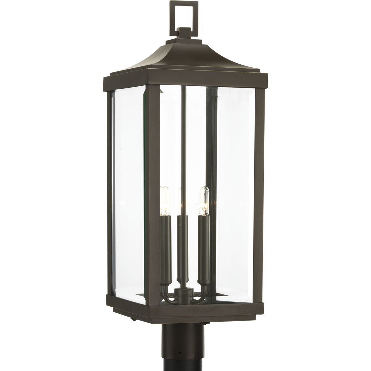Elongated frames capture the romantic charm of vintage gas lanterns. Inspired by a stroll down a Charlestonian street bearing the same name, the Gibbes Street collection's three-light post lantern features clear beveled glass and an Antique Bronze finish. Wall and hanging lanterns complete the family.