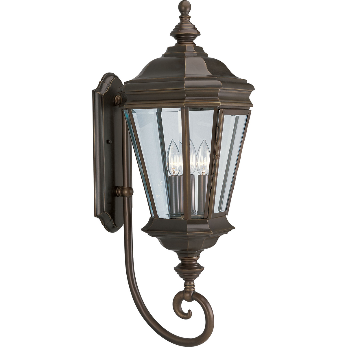 Three-light wall lantern with clear beveled glass panels and scroll arm details.