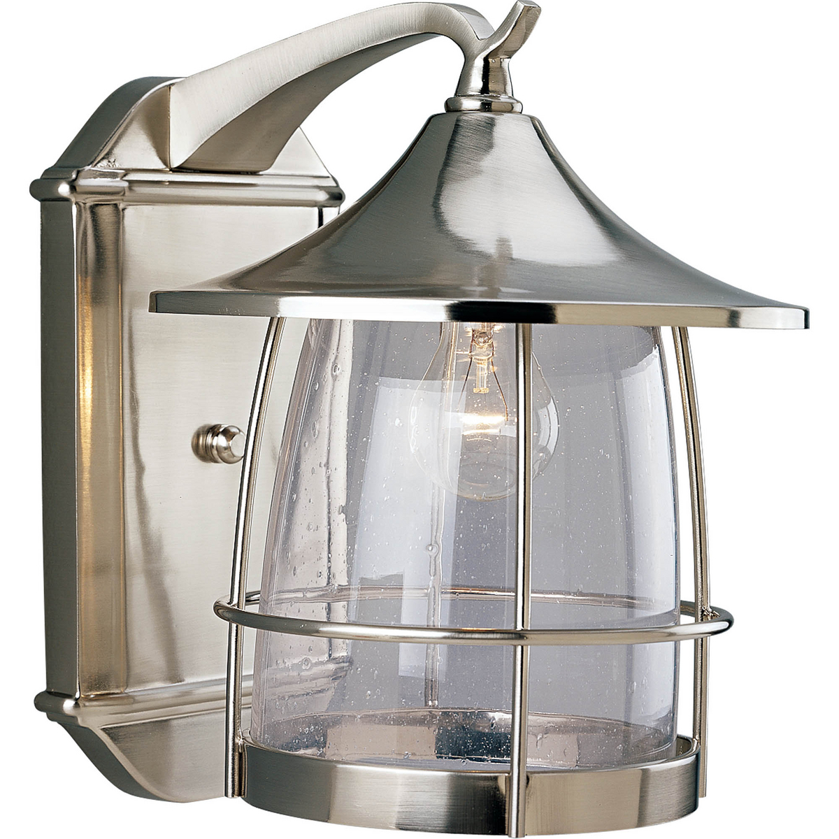 Unique cantilevered arms, distinctive roof and wire frames surround clear seeded glass. Aluminum and Brass construction. One-light large wall lantern. Brushed Nickel finish.