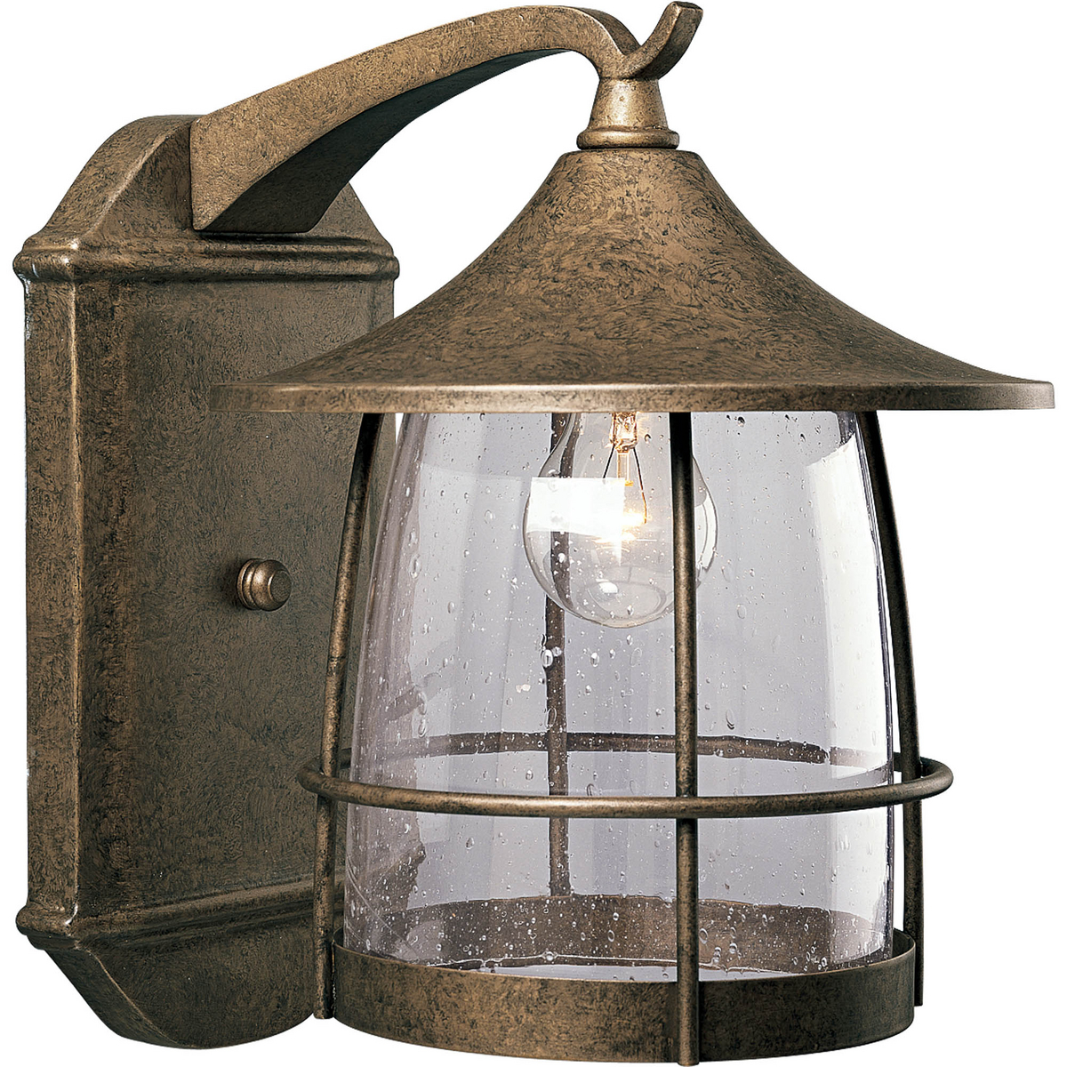 Unique cantilevered arms, distinctive roof and wire frames surround clear seeded glass. Aluminum and Brass construction. One-light large wall lantern. Burnished Chestnut finish.