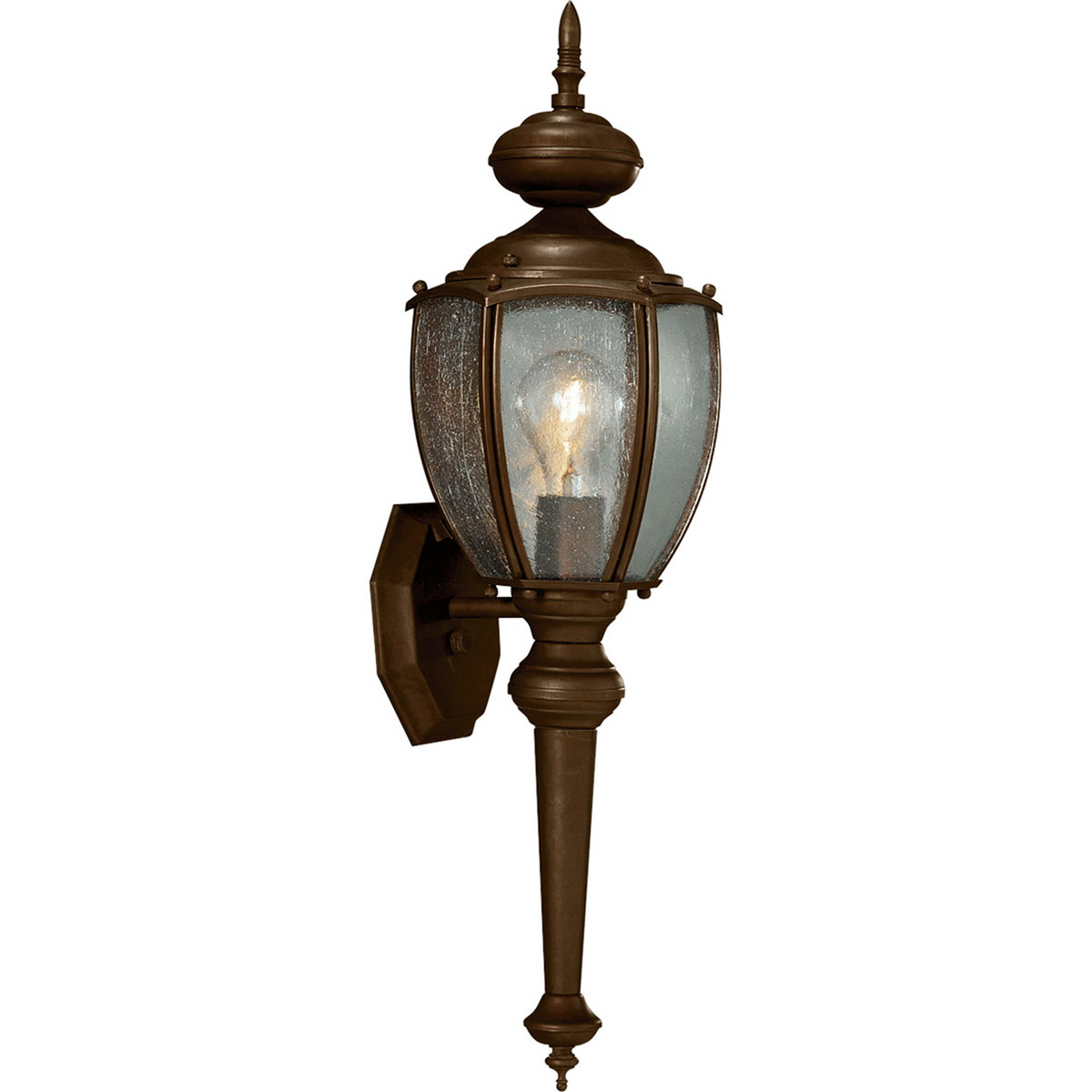 Solid one-light 7 in medium wall lantern in rich weathered finish is complemented by seeded glass panels - a great choice for low maintenance and years of enjoyment. Can be used with or without tail. Antique Bronze finish.