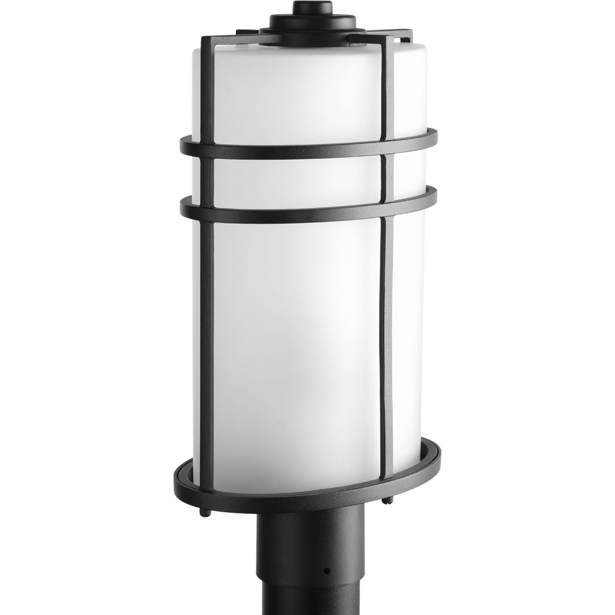 Inspired by the modern mission movement, the Format collection is comprised of an oval form factor with grid overlay. Etched glass shades and a Black finish complete the one-light post lantern. Design flexibly- can be used outdoors or in unexpected applications within interior settings.