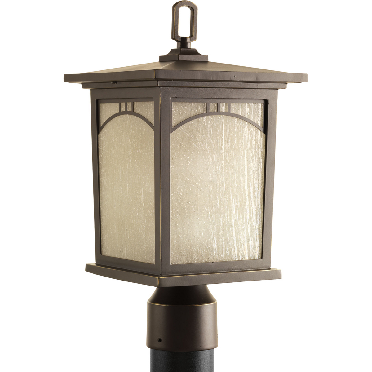 One-light post lantern with geometric details and textured art glass in an Antique Bronze finish.