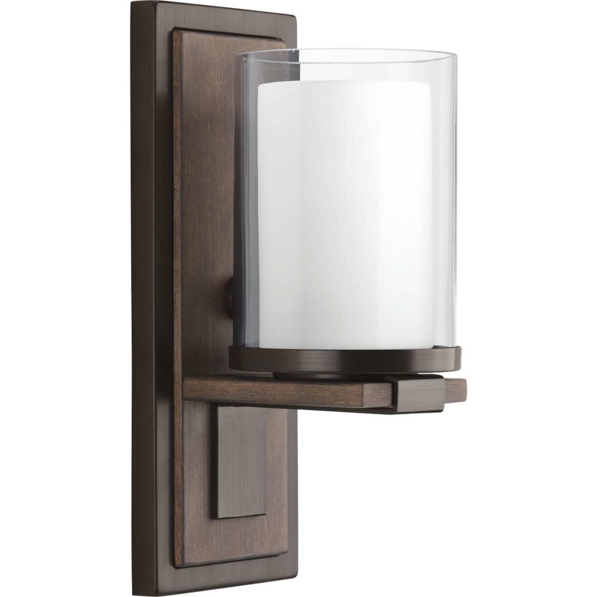 Mast has a zen-like modernism that blends the warmth of a faux-finish wooden backplate with a clean, modern pediment supporting a double-glass diffuser. The combination of clear and etched glass recreates the appearance of a votive candleholder to enhance the calming influence of this distinctive style. Antique Bronze finish.