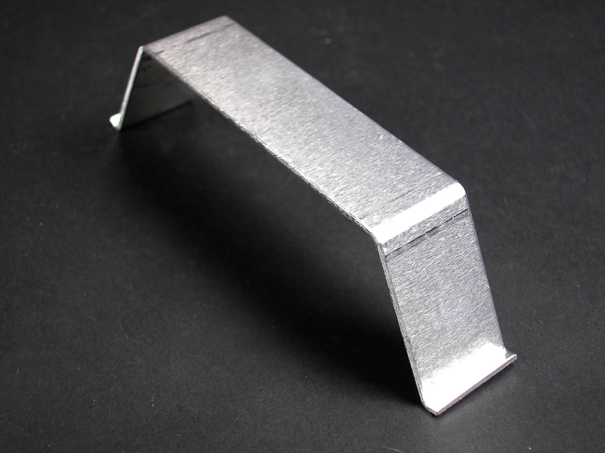 For holding conductors in place in long raceway runs. Snaps into grooves in raceway. This wire clip is 1/2 size.