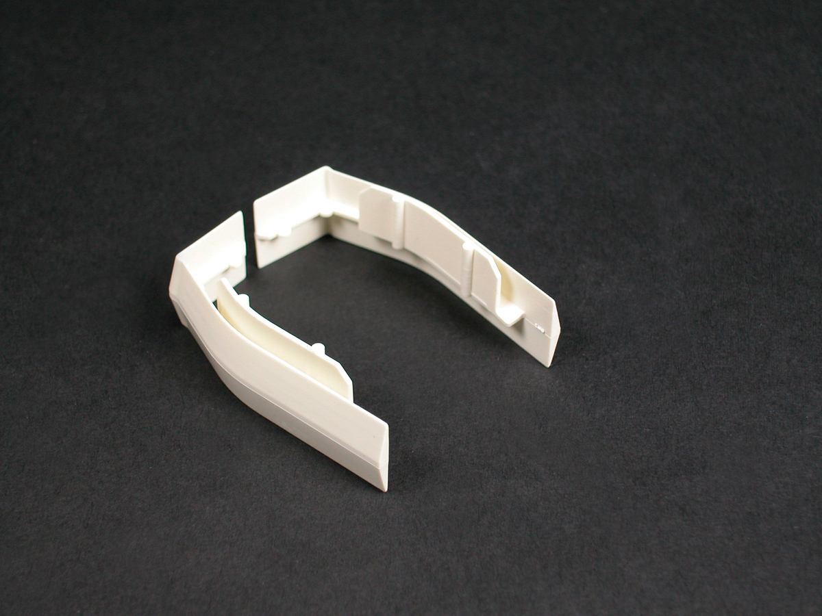 Covers seams between sections of 40N2B08 Raceway Base. White