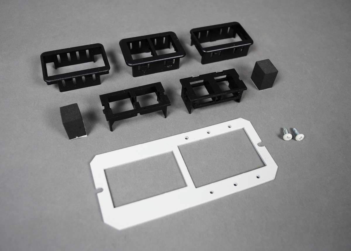 Combination device plate that will accept up to three (3) Extron Electronics MAAP style plates, and up to two (2) ports of communication devices. For use in the center compartment only. Devices supplied by others.