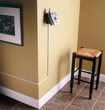 CordMate Cord Organizer is streamlined to blend with any décor. Great for concealing and organizing phone wires, cords and speaker cable. Perfect for family rooms or bedrooms. Self-adhesive backing makes it simple to install on a baseboard or wall. Paintable.