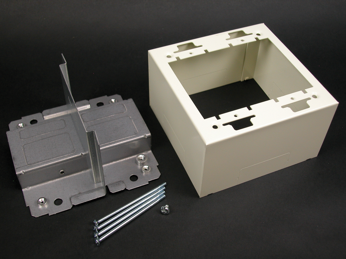 Labor saving, over-the-raceway device box. Divided two-gang box allows both power and low voltage at a single point-of-use. For use with commercially available faceplates. Ivory
