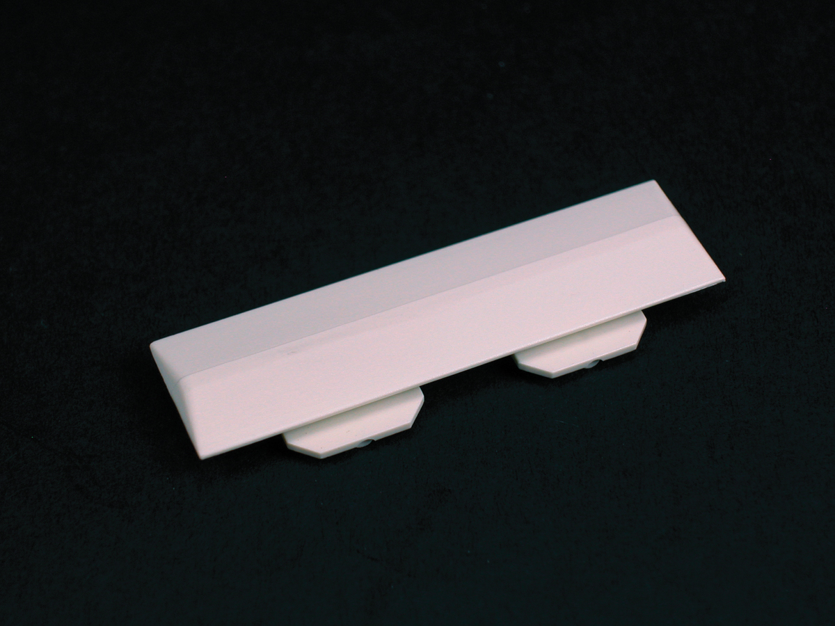 Covers seams between sections of 40N2C08 Raceway Cover. White