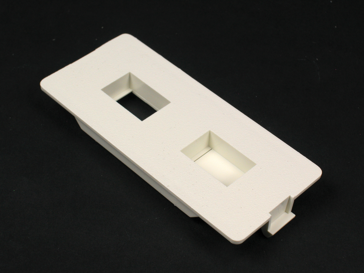 For mounting one or two keystone device modules, recessed to provide a flush installation. Has one opening and one KO. Ivory