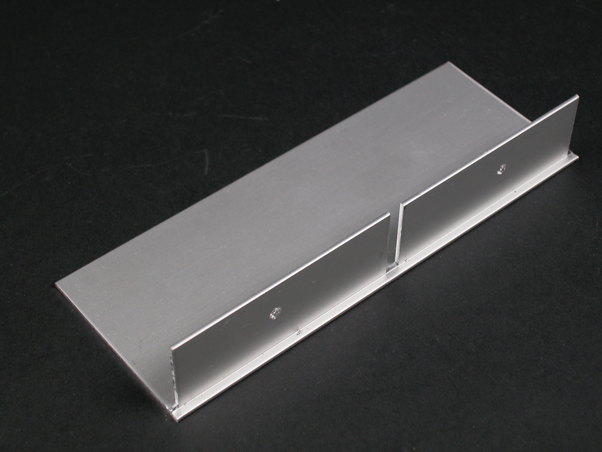 Product image for Wiremold ALA4810B 6 x 2-3/16" Satin Anodized Aluminum 2-Channel Raceway Blank End