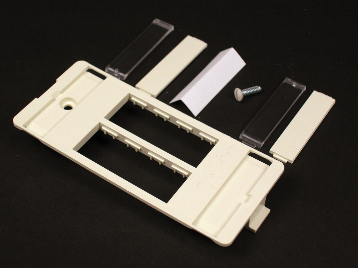 For mounting Ortronics datacom inserts. Accepts four TracJack devices. Ivory