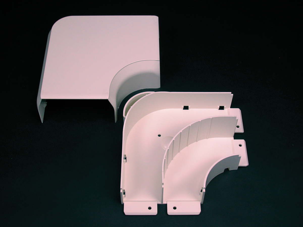 A 90 degree flat corner with integral dividers to provide 2