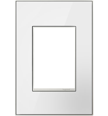 Polished and contemporary, the adorne Mirror White plate provides a new twist on classic white. The sleek white surface is surrounded by a satin nickel frame for a sophisticated finish.The 1-gang+ wall plate is larger than the standard 1-gang wall plate, meaning you can add even more devices. Each 1-gang+ setup can be used with 3 USBs, an outlet and half-size USB, any of our switches or dimmers, and most outlets.For use with adorne Furniture Power only. Sold in multiples of ten (10) plates. Steel back plate and installation hardware are not included. All other adorne wall plate colors and finished are available as customs. View our FAQ page to learn more.