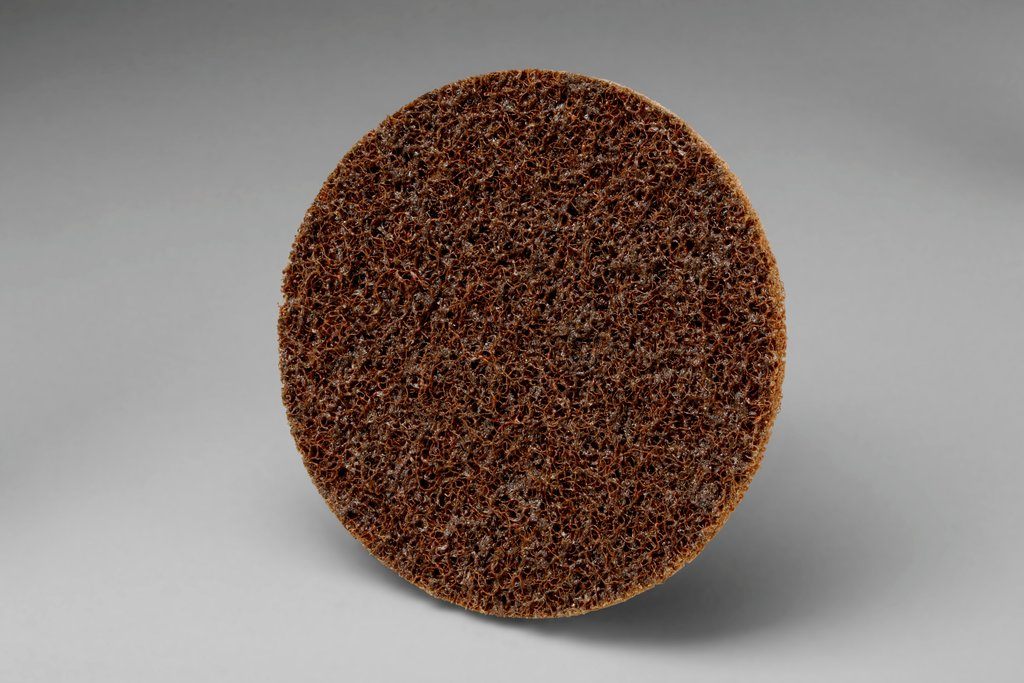 The Scotch-Brite™ Roloc™ Surface Conditioning Disc combines our durable, non-woven disc with the efficient 3M™ Roloc™ quick-change attachment system for an effective disc that cleans, finishes, blends, and deburrs. Our non-woven fiber construction conforms well to help preserve irregular or contoured surfaces and the Roloc™ backing supports the disc for aggressive cutting.