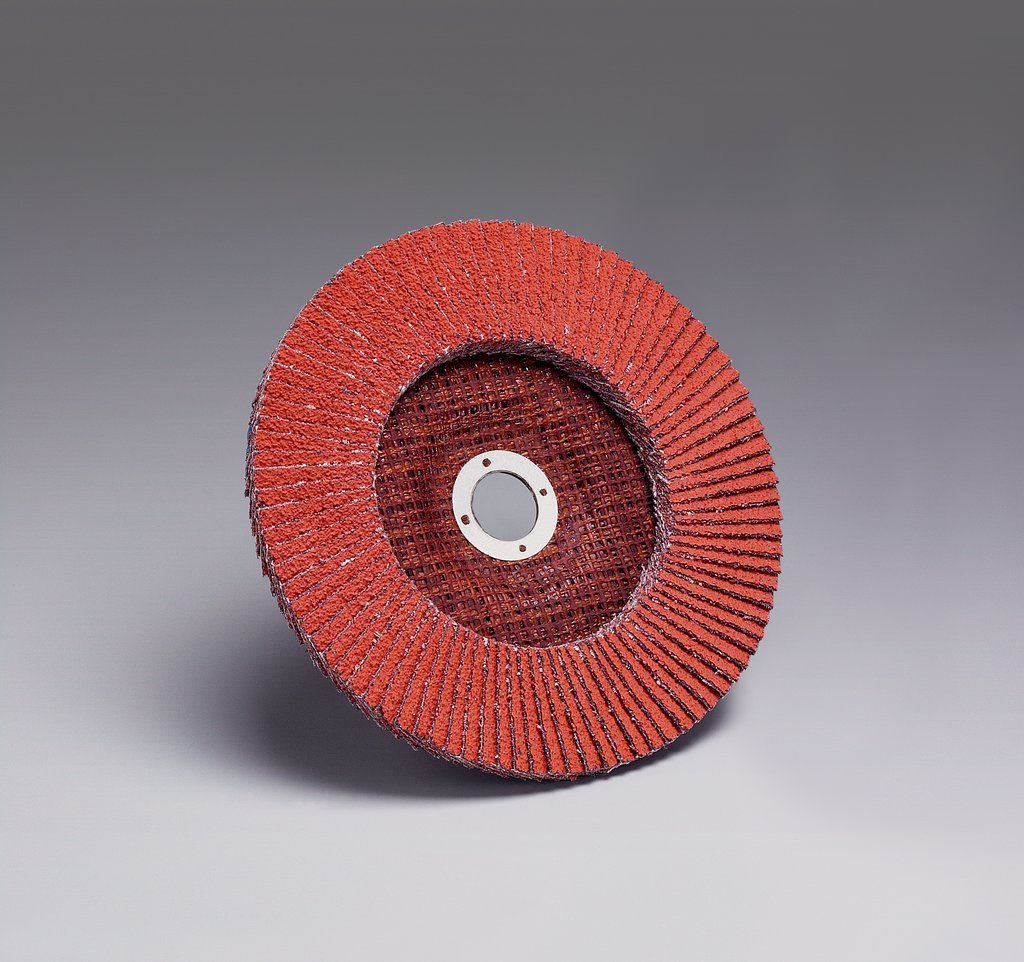 We designed the 3M™ Flap Disc 747D as a ceramic grain abrasive flap disc with a durable, X-weight cotton backing for working with stainless and carbon steels. Designed to run on a right angle grinder, a flap disc is a one-step alternative to bonded wheels and fiber discs. A unique grinding aid minimizes heat while maintaining life on heat sensitive alloys such as stainless steel.