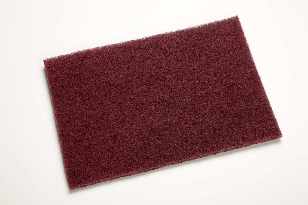 Scotch-Brite General Purpose Hand Pad 7447 combines flexibility with effective cutting action and precise hand control to accomplish tough cleaning jobs or produce fine finishing results, use after use. Very fine grade aluminum oxide abrasives cut fast and fine, leaving a smooth, finished surface. Suitable for use on a wide variety of materials and for many different tasks.