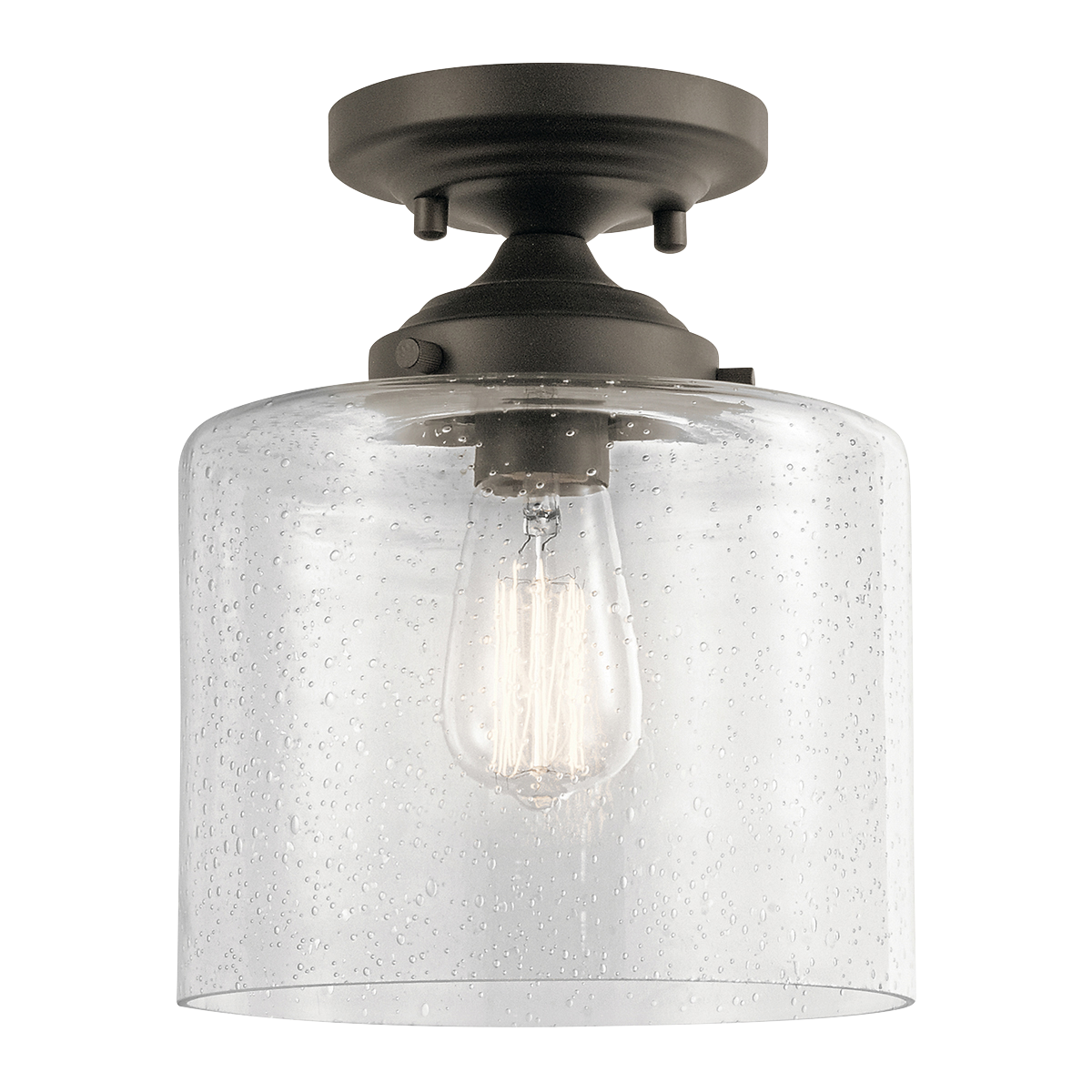 The modern Winslow 1-light semi flush in an Olde Bronze finish with Clear Seeded glass shade pair beautifully with the linear arms, bringing light and dimension to a space.