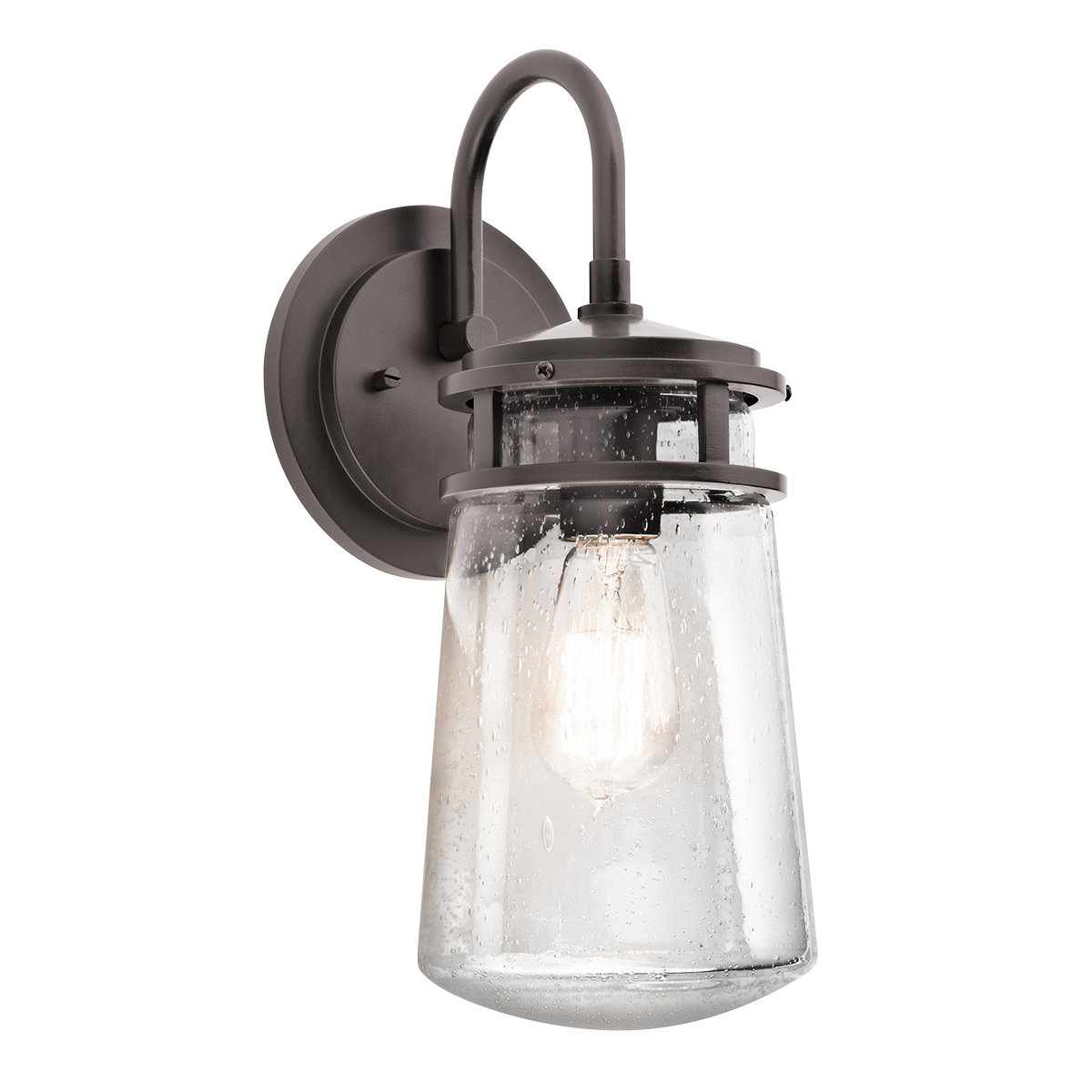 The Lyndon(TM) 15in. 1 light wall light features a classic look with its Architectural Bronze(TM) finish and clear seeded glass. The Lyndon(TM) wall light works in several aesthetic environments, including transitional and nautical.